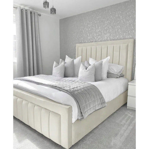 Ivory velvet Bumper Panel Bed dressed with white bedding and grey throw