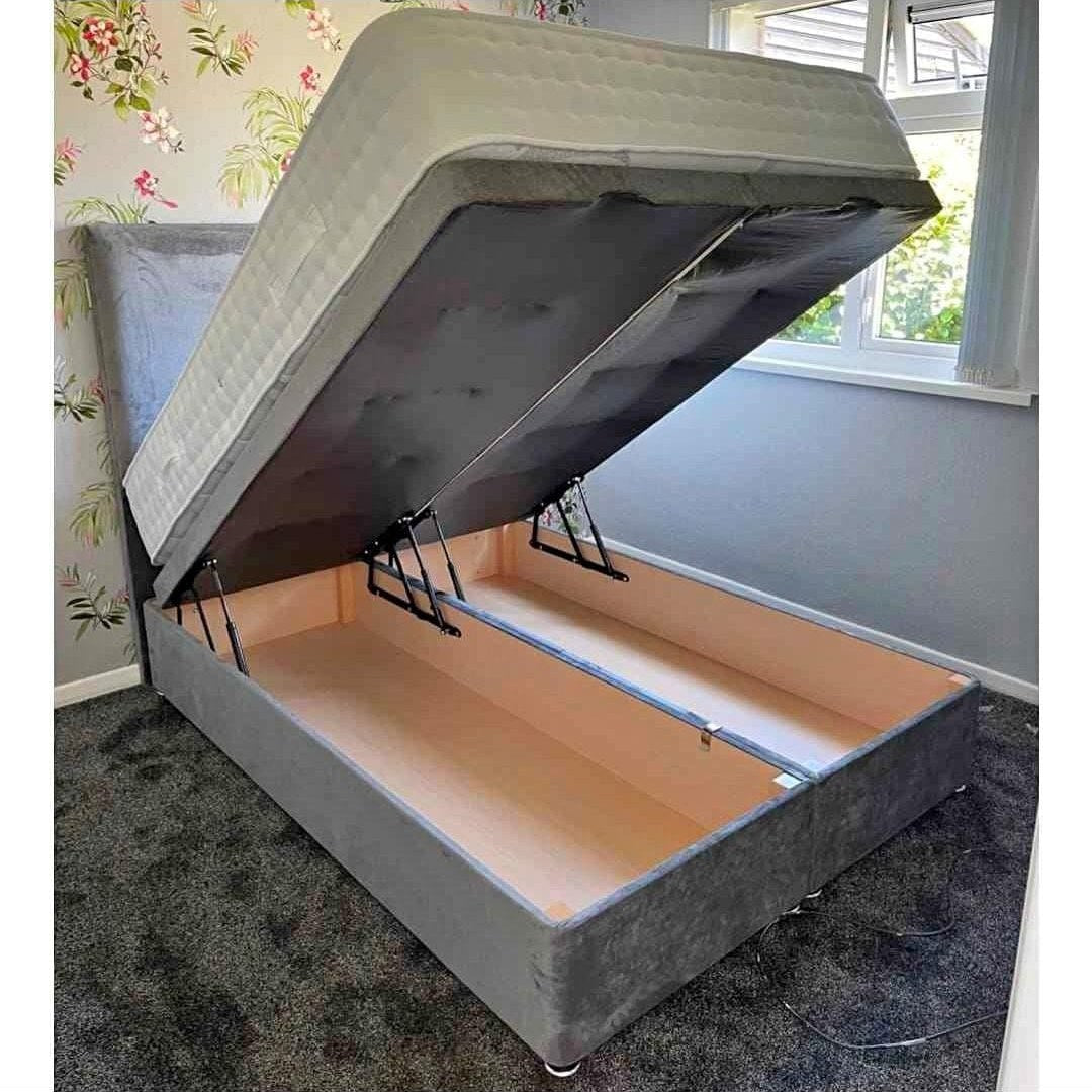 Grey Divan Ottoman bed with gas-lift storage base lifted