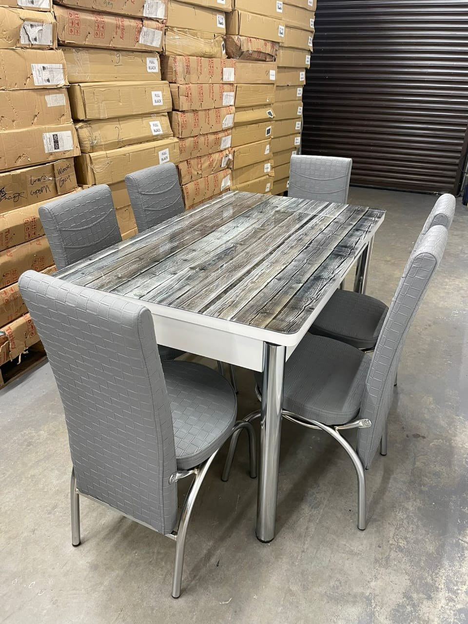 Extendable Glass Dining Table with 6 Chairs in grey wooden effect from Kensley Home