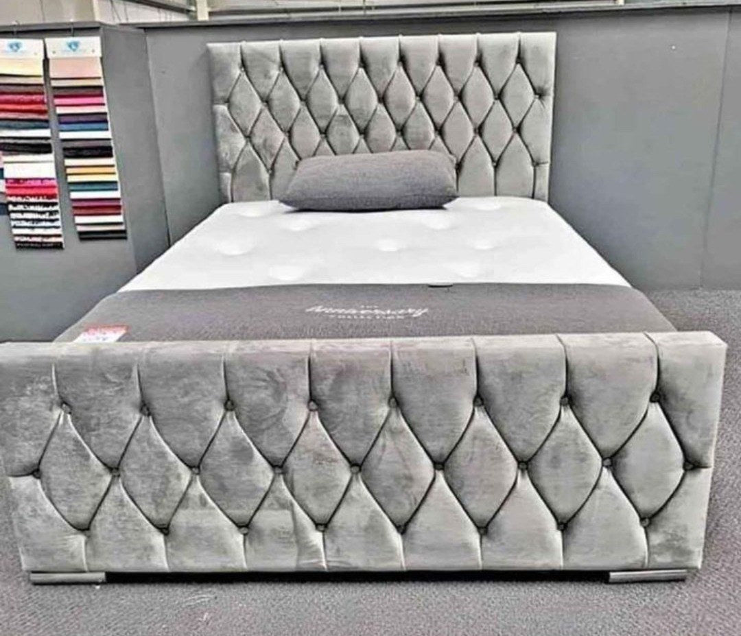 Silver crushed velvet Florida Bed with diamond-buttoned footboard