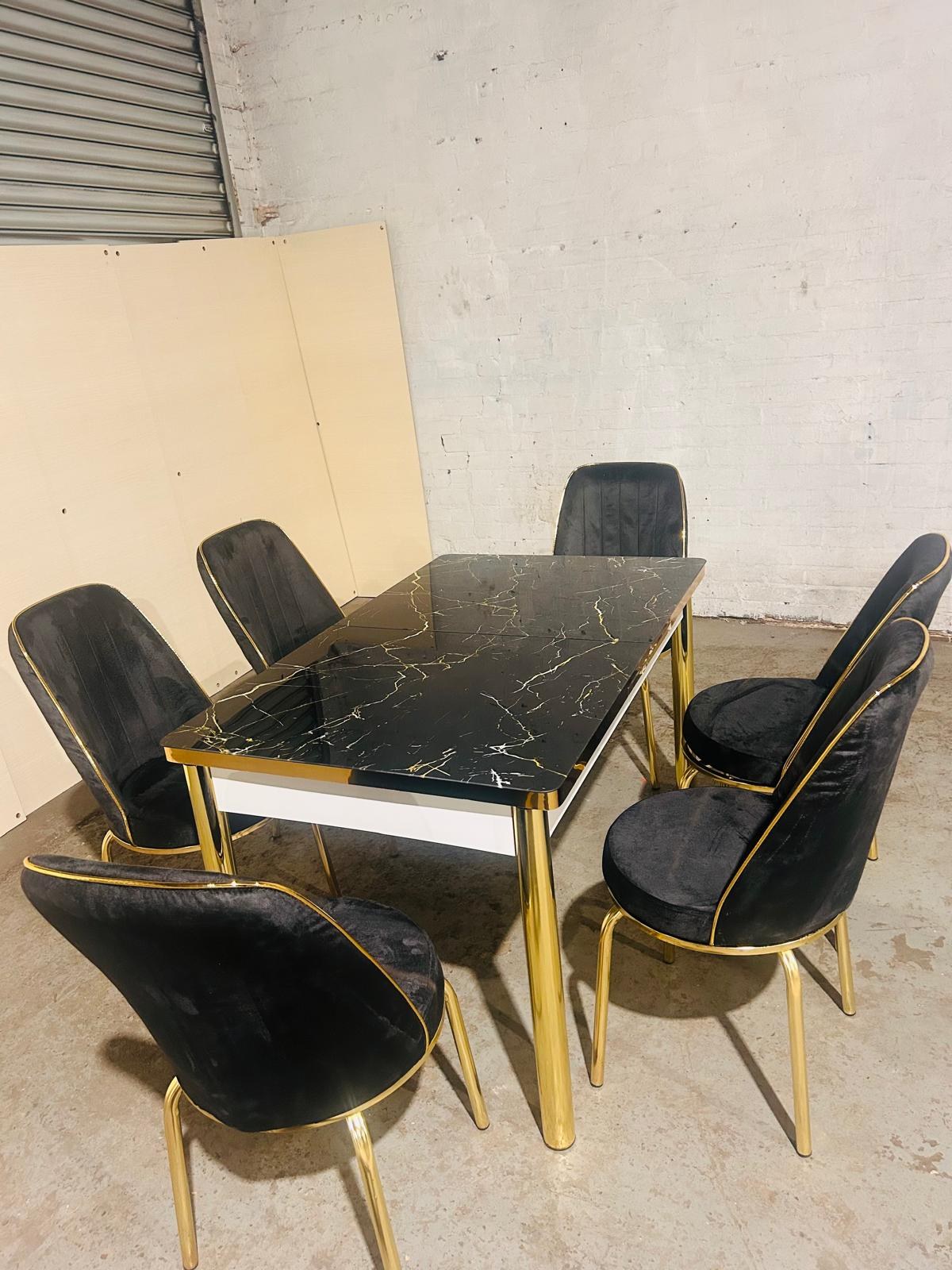 Gold Frame Extendable Dining Table with 6 Chairs in black gold from Kensley Home