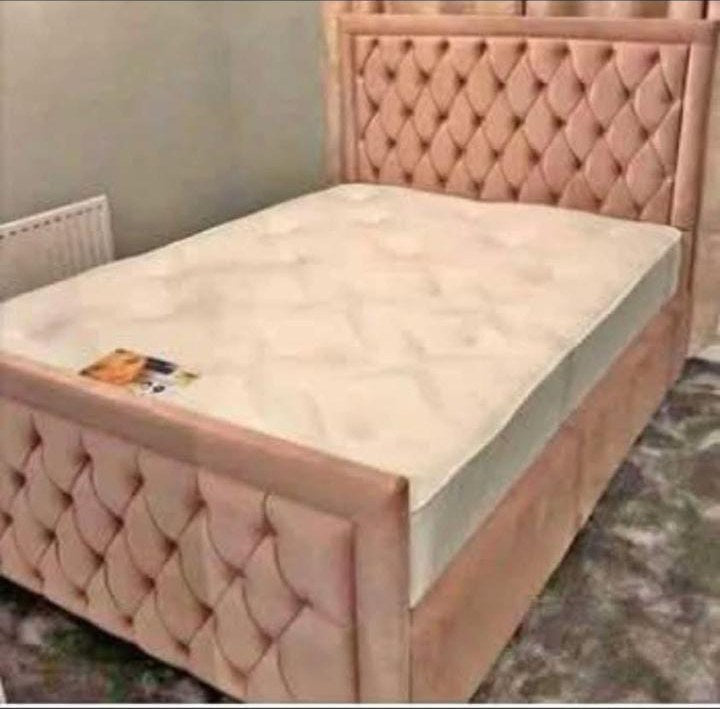 Pink velvet Hilton Bed with buttoned footboard