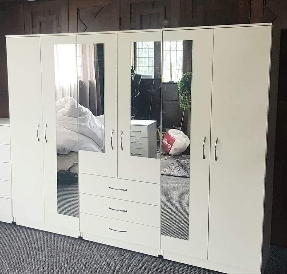 White 4-door hinged wardrobe with two full-length mirror doors and three drawers