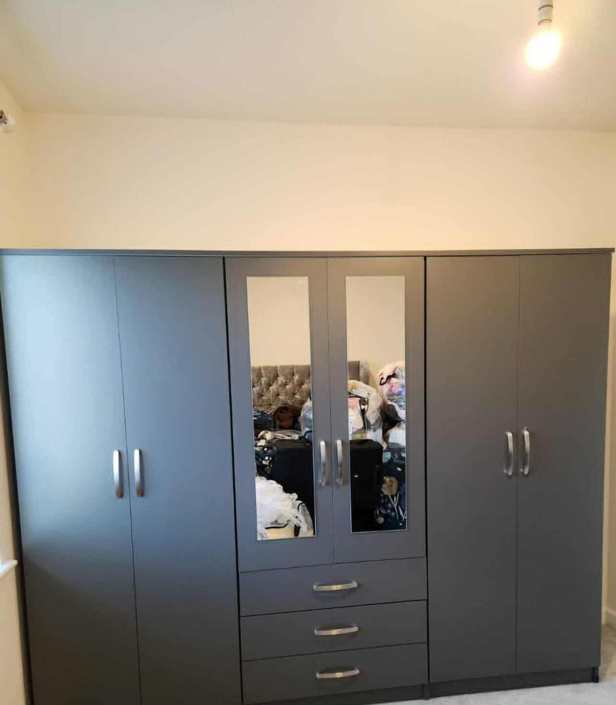 Grey 6-door wardrobe with two mirror doors and central drawers