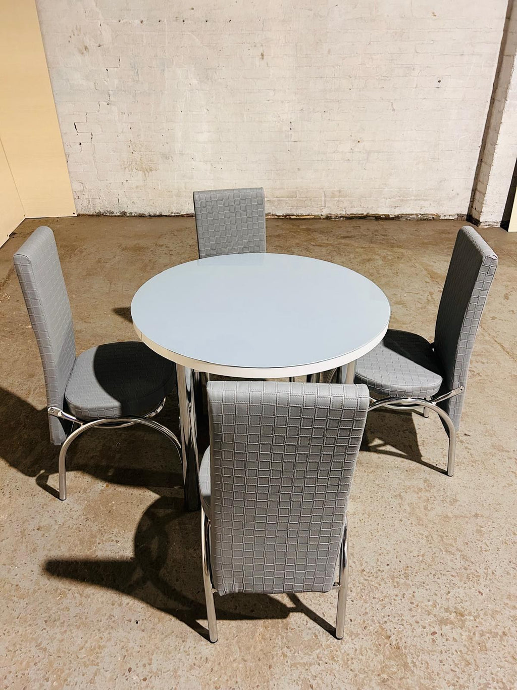 Round Glass Dining Table with 4 Chairs in full grey from Kensley Home