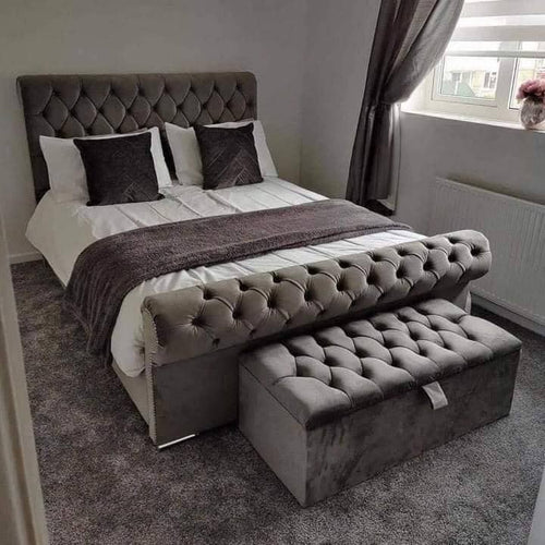 Grey velvet chesterfield Sleigh Bed with scrolled footboard and matching ottoman