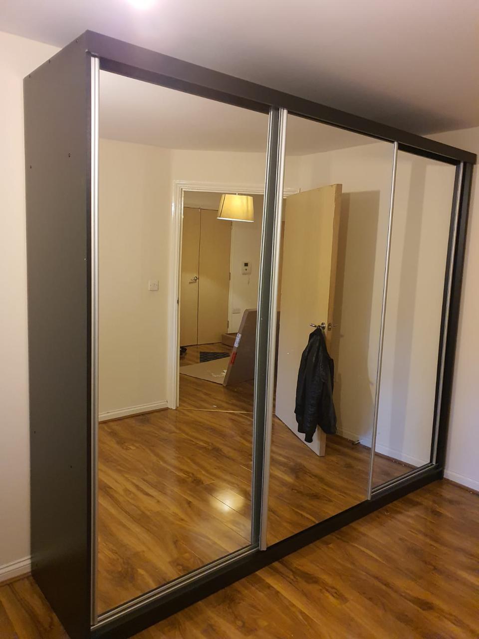 Black 3-door mirrored sliding wardrobe