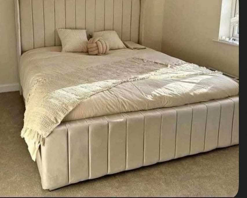 Cream velvet Wingline Panel Bed with high panelled footboard